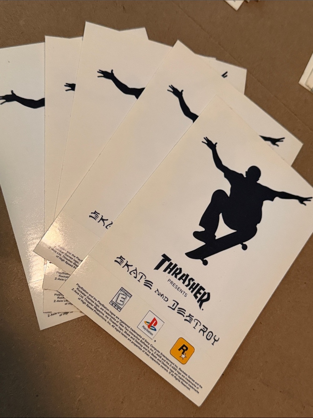 ROCKSTAR GAMES: THRASHER presents SKATE AND DESTROY. Batch of 5 stickers.